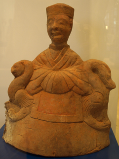 西王母像（漢代の素焼き像）.png
